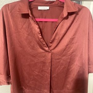 LUSH brand cropped collared shirt.